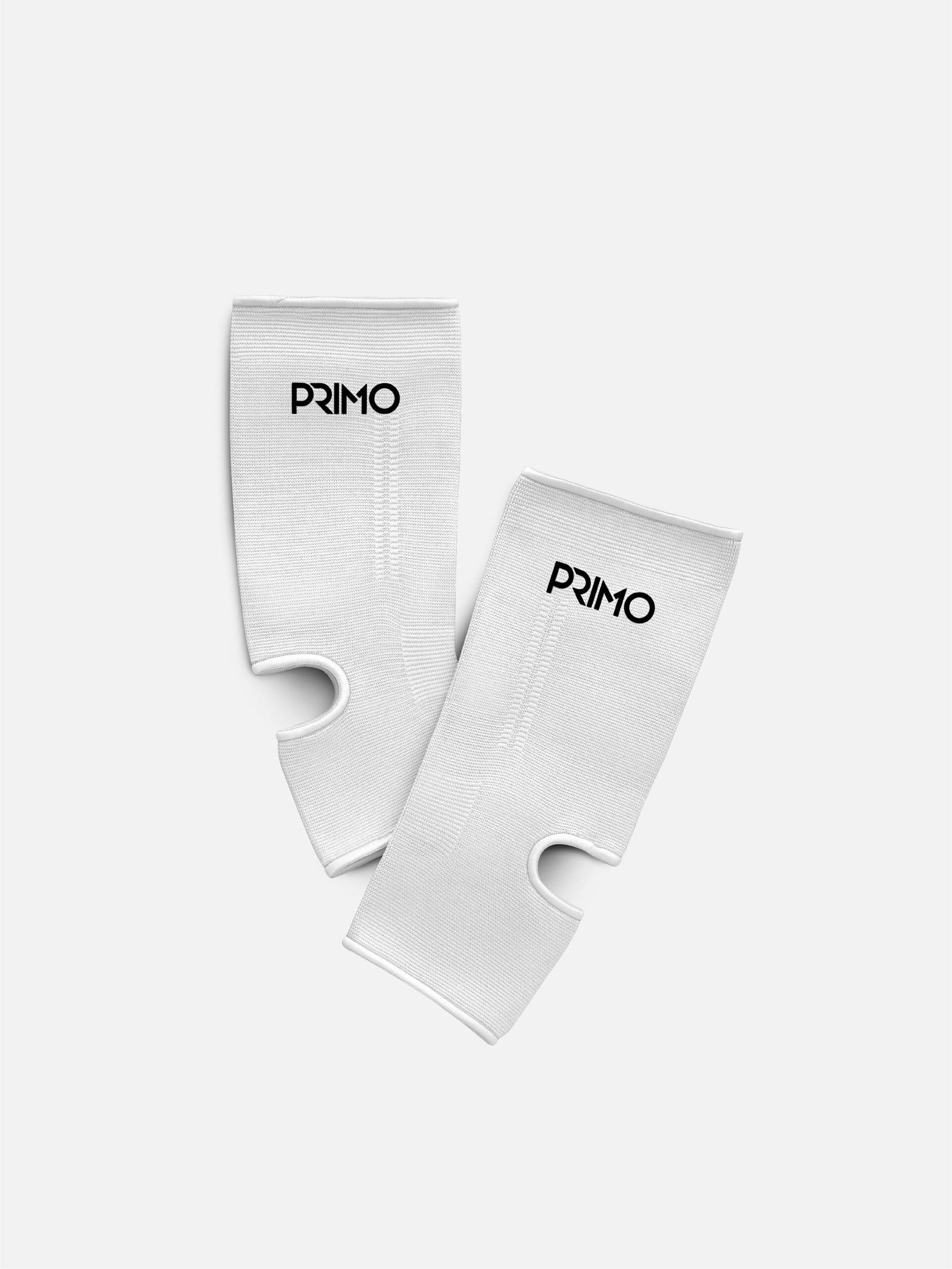 primo-fight-wear-official-primo-monochrome-ankleguards-white-67222684008676 Tobilleras Primo Monochrome - White - Imagen 1